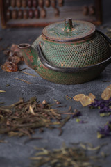 Obraz na płótnie Canvas Green tea mix on dark background, Selective focus