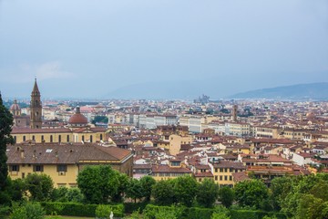 Fototapeta premium View of the city of Florence from the Boboli gardens, cloudy and rainy weather. Florence, Italy.