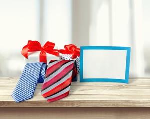 Fototapeta na wymiar Gift box with ribbon on background