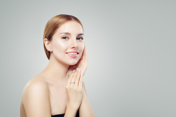 Glamour jewelry model. Beautiful woman with diamond earrings and luxurious ring portrait