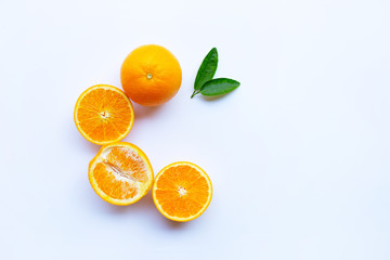 High vitamin C. Fresh orange citrus fruit with leaves isolated on white