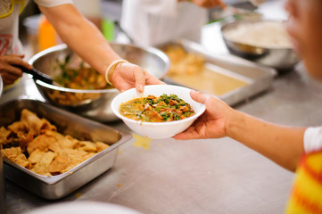 Relief of hunger for homeless people with free charity food