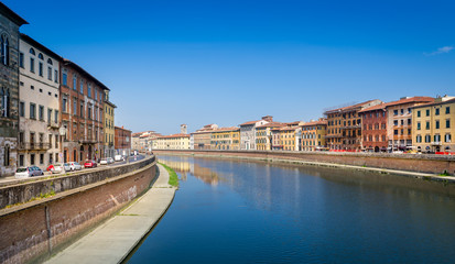 Naklejka na ściany i meble Pisa embankments at Arno river. Toscana province, Italy