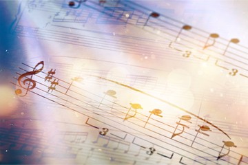 Sheets with music notes, close-up view