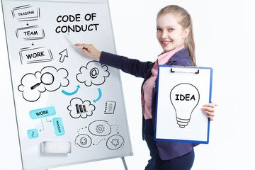 Business, technology, internet and networking concept. Young entrepreneur showing keyword: Code of conduct