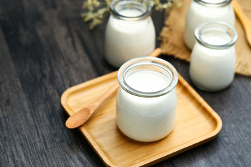 Obraz na płótnie Canvas smoothie or milk shake or yogurt in glass bottle
