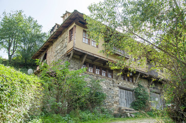 Fototapeta na wymiar Old house in historical cultural reserve Dolen , Bulgaria