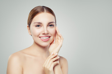 Young woman face. Perfect girl with healthy skin. Healthcare and spa concept.