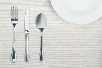 Silverware. Fork, spoon and knife isolated on white