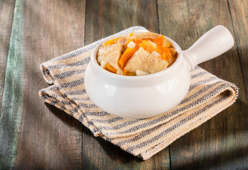Tripe soup, traditional Colombian food - Wooden background