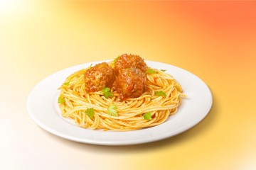 pasta with meatballs and parsley with tomato sauce