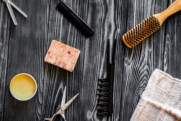 Tools for cutting beard barbershop top view on wooden background