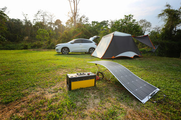 Camping solar panels installed elements equipment with power box and lamp for facilitate camping.