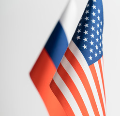 Fototapeta premium The flags of the USA and Russia on a white background isolated. The concept of policy