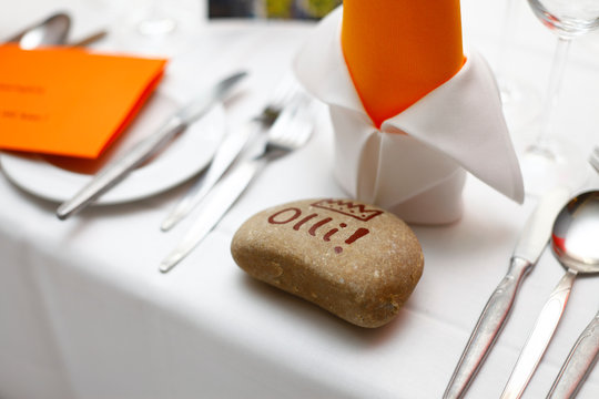table decorated with a nametag as a stone olli