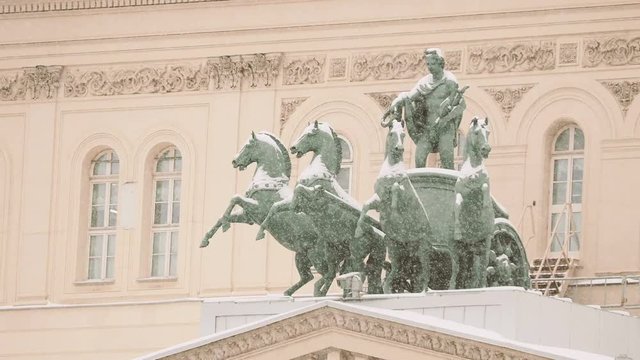 Bronze sculpture of god Apollo on quadriga of his muses on Bolshoi Theatre. Moscow, Russia.