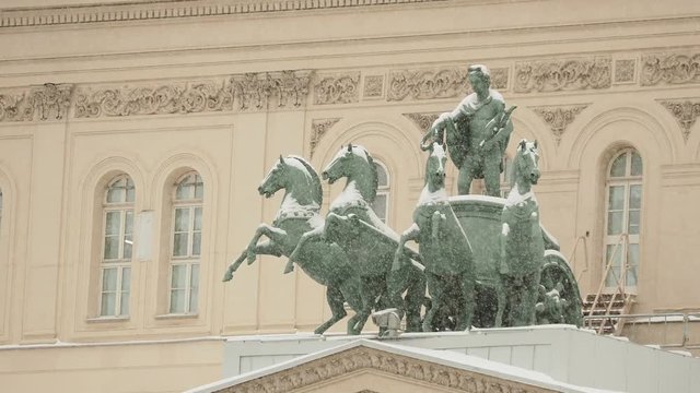 Bronze sculpture of god Apollo on quadriga of his muses on Bolshoi Theatre. Moscow, Russia.
