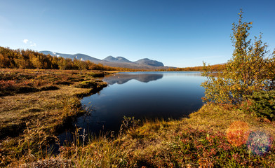 Krajobraz z jeziorem, Norrbotten, Szwecja - 249113125