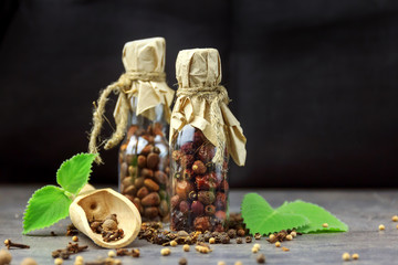 Dried hawthorn fruits on black background. Front view