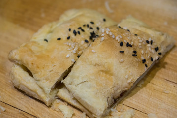 Berry baked pie on a cutting board