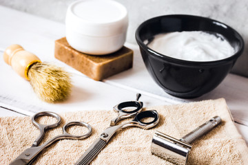 Mens hairdressing wooden desktop with tools for shaving