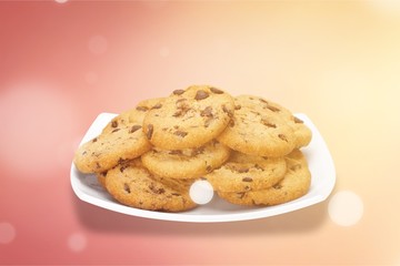 Plate of chocolate chip cookies isolated on