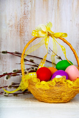  Easter eggs in a basket and willow.