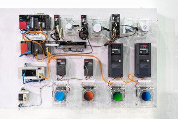 advance technology automatic Programmable Logic Controller PLC and many of high precision and accuracy equipment circuit connection diagram for system control in industrial work on wall