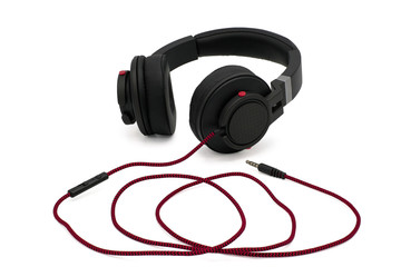 Black headphones isolated on white background.