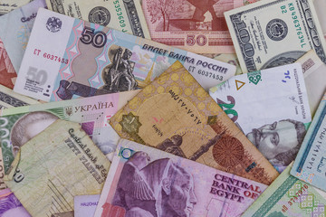 Multicurrency background of US dollars, Russian rubles, Belarusian rubles, Egyptian pounds and Ukrainian hryvnias