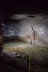 静岡県賀茂郡松崎町の室岩洞内です。かつて「伊豆石」を採掘していた坑道です。 千石船で運搬していた為、海側に通じており、安城岬や大鐘山、松崎新港が望めます。天気が良ければ、駿河湾から富士山も望めます。