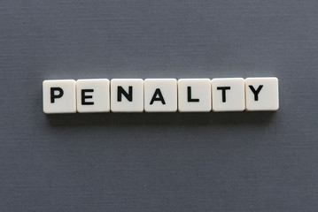 Fototapeta na wymiar Penalty word made of square letter word on grey background.