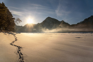 mountains sun fog dawn snow river