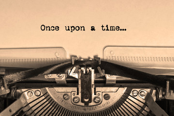 once upon a time...  printed on a sheet of paper on a vintage typewriter. writer, journalist.