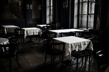 Modern and simple cafe interior with wooden classical furniture.