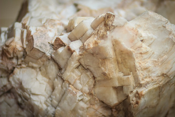 Calcite ore in the limestone quarry from mining and quarrying industries. Calcite is a carbonate mineral and the most stable polymorph of calcium carbonate (CaCO3).