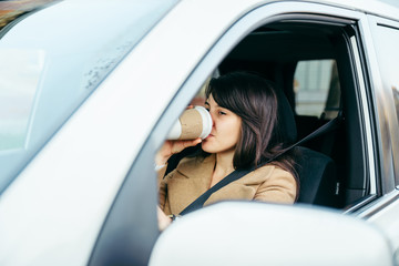 woman driving car. safety belt