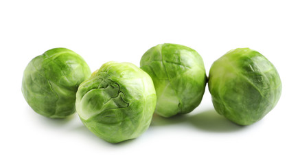 Fototapeta premium Fresh tasty Brussels sprouts on white background