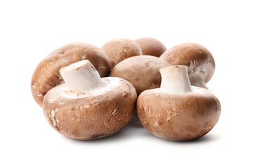 Fresh champignon mushrooms isolated on white. Healthy food