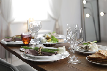 Festive Passover table setting at home. Pesach celebration
