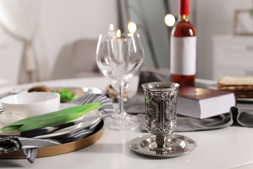 Fototapeta premium Festive Passover table setting at home. Pesach celebration