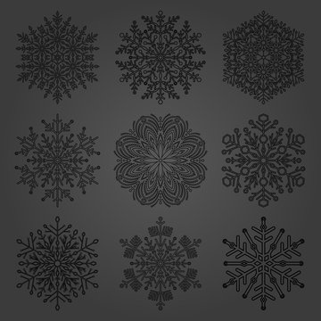 Set of vector snowflakes. Black winter ornaments. Snowflakes collection. Snowflakes for backgrounds and designs