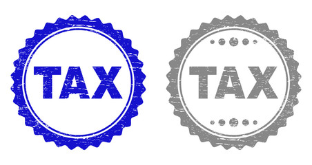 Grunge TAX stamp seals isolated on a white background. Rosette seals with grunge texture in blue and grey colors. Vector rubber stamp imitation of TAX title inside round rosette.