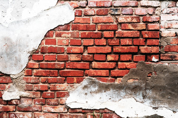 Background from old shabby red brick close up