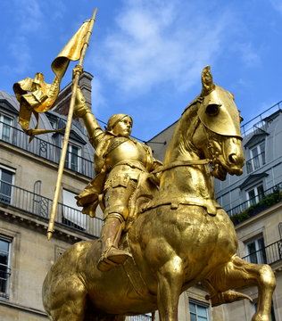 Jeanne dArc golden statue located at Place des Pyramides. Paris, France.