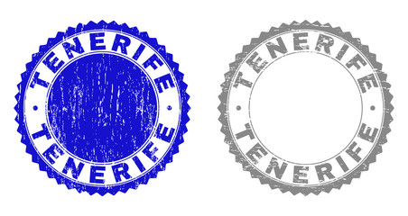 Grunge TENERIFE stamp seals isolated on a white background. Rosette seals with grunge texture in blue and gray colors. Vector rubber stamp imitation of TENERIFE title inside round rosette.