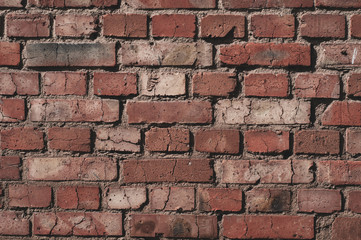 Background from old brick with cracks close up