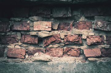 old brickwork with broken red rough cracked bricks