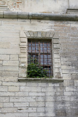 window in stone wall