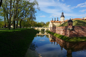 Nesvizh Castle on a sunny day. Nyasvizh, Nieśwież, Nesvizh, Niasvizh, Nesvyzhius, Nieświeżh, in Minsk Region, Belarus. Site of residential castle of the Radziwill family. 